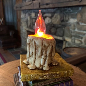 Whimsical Antiqued Book Stack Lamp or Night Light with Dripping Candle and Flickering Bulb
