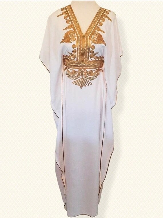 white and gold abaya