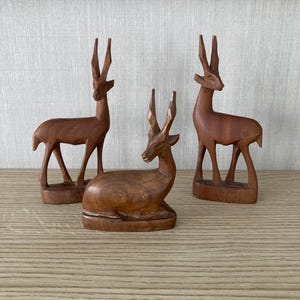 Set of three Vintage Antelope Figurines, Small, carved, solid wood.  Antelope ornaments.  Wooden Antelope Figurines. Deers. Herd of deer