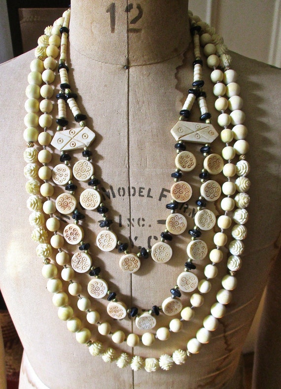 Vintage set of three Carved Bone Necklaces