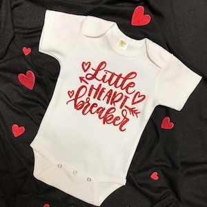 Little Heart Breaker Valentines Day baby bodysuit/one piece with Glitter Red graphic.