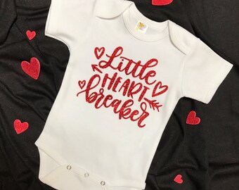 Little Heart Breaker Valentines Day baby bodysuit/one piece with Glitter Red graphic.