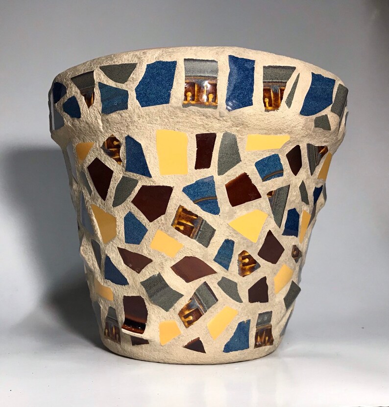 8 pot in gold blue and gray. Large brown