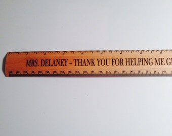 Thank you gift for your teacher.  Personally engraved ruler with the phrase "Mrs._____ thank you for helping me grow.  You Rule!"