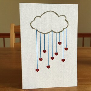 Kaart met regenende harten