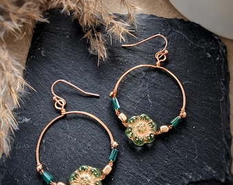 Handmade copper flower hoop earrings with green and gold beads, lightweight, boho