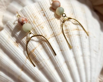 Handmade brass arch earrings with natural matt green and peach gemstones