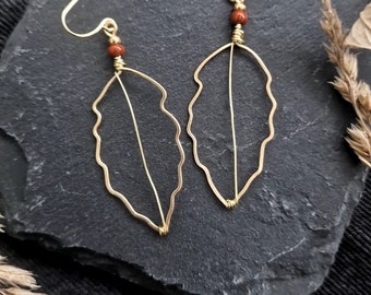 Handmade gold plated leaf earrings with deep rust beads, minimalist, botanical, wire earrings