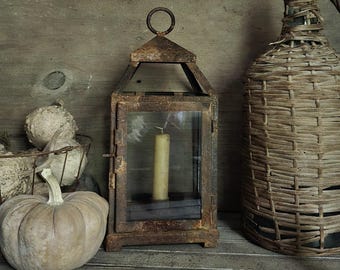 Rusty glass and tin lantern