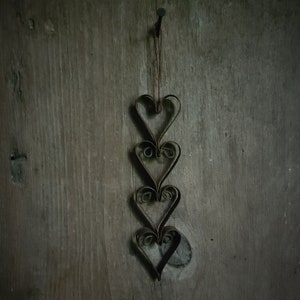 Old rusty metal heart hanger