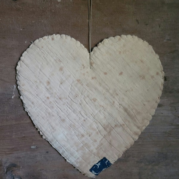 Handsewn quilting heart with patch