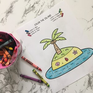 May include: A printable coloring page featuring an island with a palm tree, a starfish, a seashell, and a ladybug. The letters I, A, and M are scattered throughout the image. The instructions at the top of the page read "Color the Island" and list the colors to use for each letter.