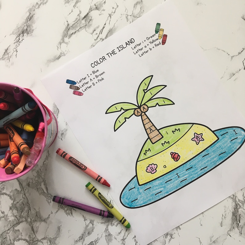May include: A printable coloring page featuring an island with a palm tree, a starfish, a seashell, and a ladybug. The letters I, A, and M are scattered throughout the image. The instructions at the top of the page read "Color the Island" and list the colors to use for each letter.