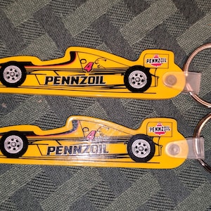 Vintage NOS PENNZOIL oil motor Key chain Ring Formula One Race Car Yellow lot ornament