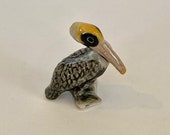 Hand-Painted Miniature Porcelain Pelican Figurine 25119