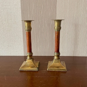 2 Vintage Kerzenhalter aus Messing und Holz.