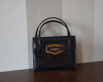 Vintage black patent leather two handled handbag.