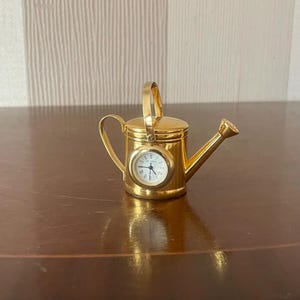 Vintage miniature watering can clock by William Widdop, vintage desk clock good working.
