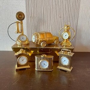 Set of 6 vintage miniature quartz clocks for restoration, spare or repair.