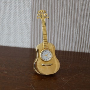 Vintage miniature quartz clock, Park Lane miniature clock., good working.