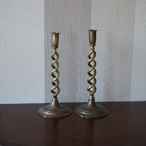 2 Antike Kerzenhalter aus Messing.