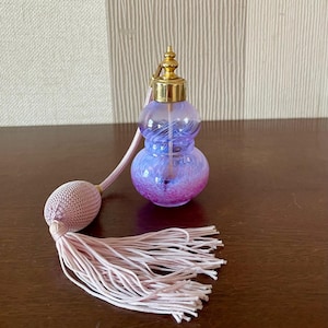 Vintage Murano Italian art glass perfume bottle with atomizer.