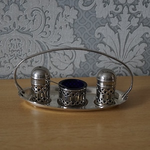 Vintage five piece silver plate condiment set.