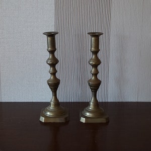 2 Antike Kerzenhalter aus Messing.