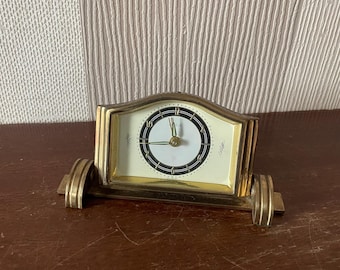 Vintage mekanisk väckarklocka i mässing från Ranela. Tillverkad i Västtyskland. Vintage väckarklockor, bordsklockor, fungerande.