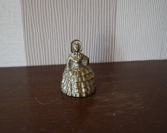 Vintage brass lady bell, hand bell.