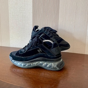 Pair of stylish, luxury Chanel sneakers LG 36299, size Eu 38. Uk 5, Us 7.5. Made from black velvet.