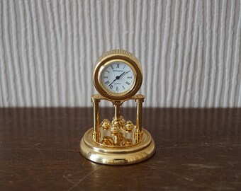 horloge à quartz miniature vintage, horloge miniature Wellington., bon fonctionnement.