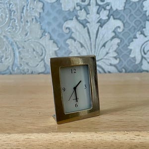 Vintage miniature quartz clock, good working.