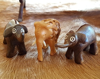 3 Vintage Carved Wood Elephant Figurines: Collectible Animal Sculpture