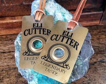 2 Vintage Whiskey ELI CUTTER Brass Tags~Advertising Tags~Legendary Taste!
