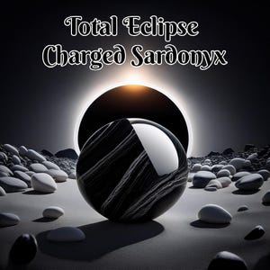 May include: A black and white sphere with a reflective surface, featuring a striped pattern, is the focal point of this image. The sphere is set against a backdrop of a solar eclipse, with the text "Total Eclipse Charged Sardonyx" at the top.