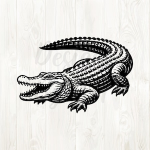 May include: A detailed black and white illustration of an alligator with its mouth open, revealing sharp teeth. The alligator's textured skin and claws are clearly visible. The image is a graphic design, likely for apparel or decor.