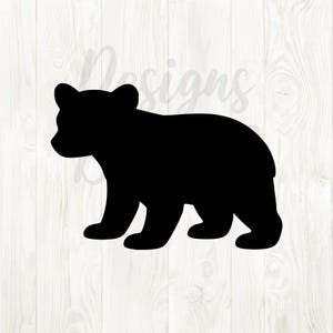 May include: A handmade wooden sign with the text "Welcome" in a handwritten style. The sign is painted white with a distressed finish, and a small green leaf is attached to the top. The sign is designed for home decor.