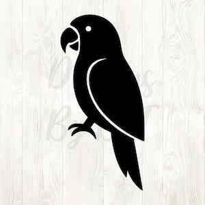 May include: A black silhouette of a parrot with a curved beak, perched on a surface. The bird's body is solid black, with a white outline defining the wing and chest. The background is a light wood grain pattern.