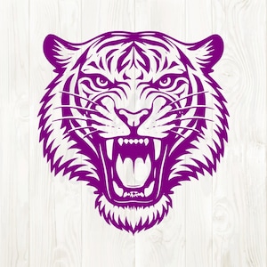 May include: A purple tiger head illustration with an open mouth, bared teeth, and detailed fur markings. The tiger's face is centered, showcasing its fierce expression. The background is a white wood grain pattern.