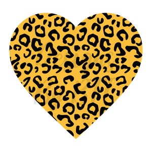 Pode incluir: Um coração amarelo com um padrão de leopardo preto.