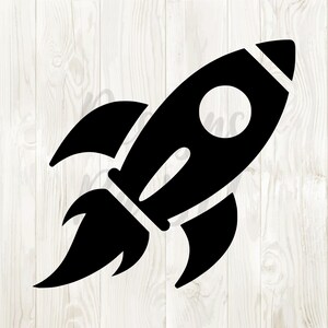 May include: Black silhouette of a rocket ship with a flame coming out of the back.