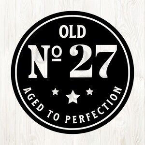 May include: Black and white circular design with the text "Old No. 27 Aged to Perfection" and three white stars.