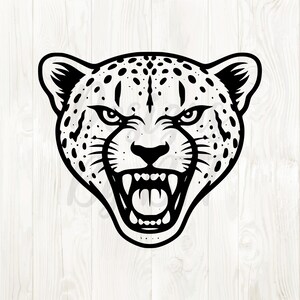 May include: A black and white illustration of a cheetah's head, showcasing an aggressive expression. The cheetah's mouth is open, revealing sharp teeth. The design includes spots and detailed facial features.