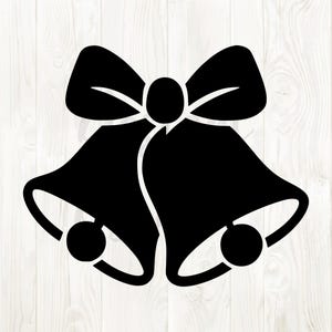 May include: Black silhouette of two Christmas bells with a bow at the top. Each bell has a small ball at the bottom. The image is set against a white wood grain background.