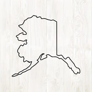 May include: A black outline of the state of Alaska against a white wood grain background. The state's shape is clearly defined, with its distinctive coastline and borders. The image is a simple, minimalist design.