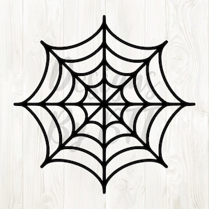 May include: A black spiderweb design, perfect for Halloween decorations. The web is centered and symmetrical, with radiating lines and concentric circles. The design is set against a white wood grain background.