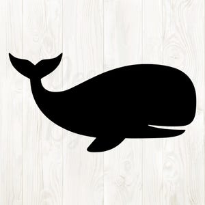 Könnte beinhalten: Schwarze Wal-Silhouette auf weißem Holzmaserungshintergrund. Der Wal ist im Profil dargestellt, mit einem geschwungenen Körper, Schwanz und kleiner Flosse. Schlichtes, minimalistisches Design.