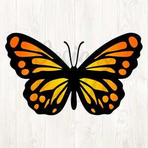 Puede incluir: Una mariposa negra y naranja con un degradado amarillo. La mariposa tiene manchas negras en sus alas.
