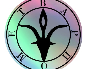 May include: A circular sticker with a holographic finish. The design features a black goat head within a circle, surrounded by the letters "E T M O B A P H". The background has a gradient of pastel colors.
